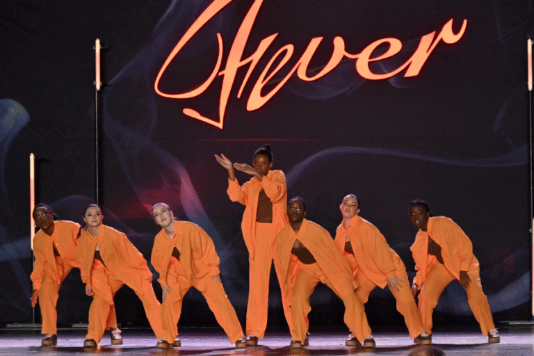 Urban dance performance on stage, Rachel Jasmin Dance School.