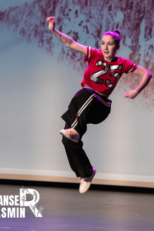 Competition dancers rehearsing on stage